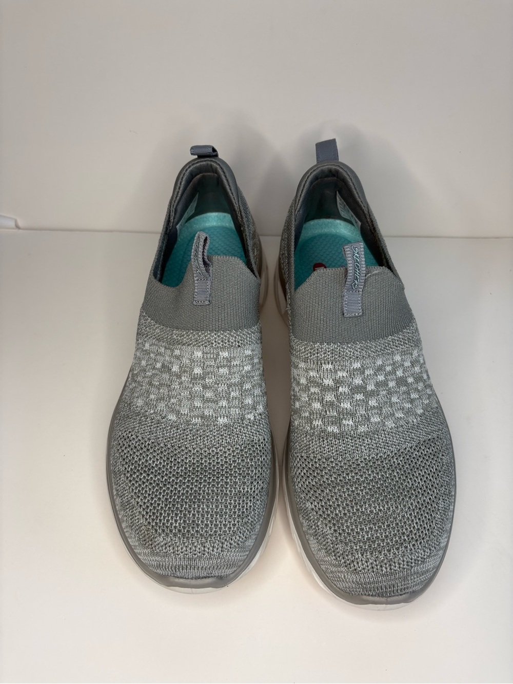 Skechers Slip-On Knit Sneakers in Light Gray with Teal Insoles